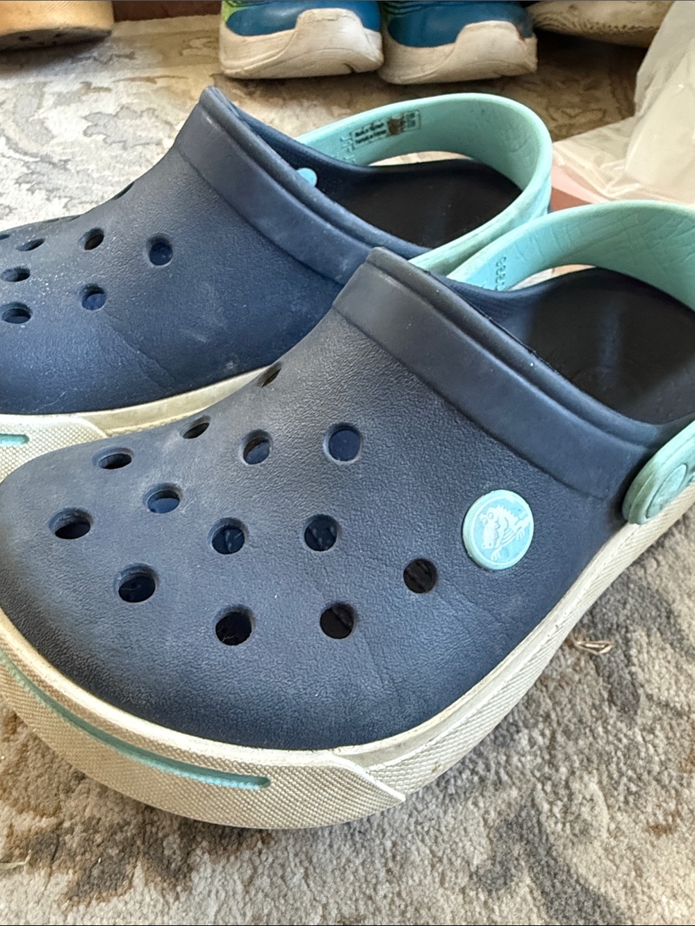 CROCS Kids Navy Clogs with light turquoise Strap